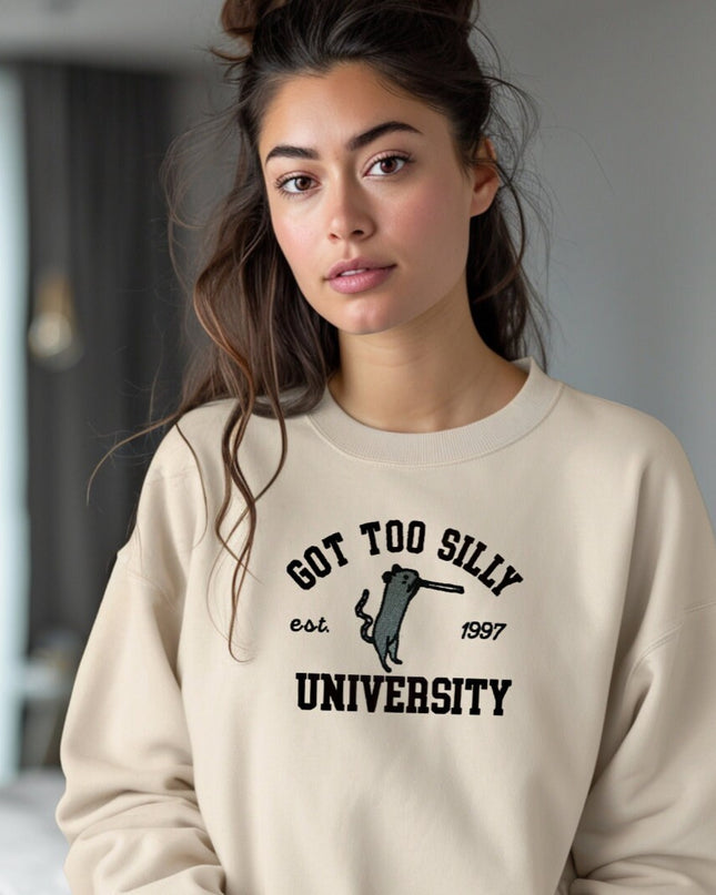 a girl in a sweatshirt is posing for a picture