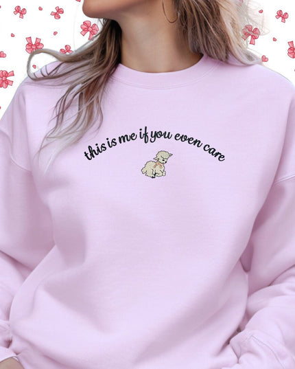 a woman wearing a pink sweatshirt with the words,&#39;this is me if you