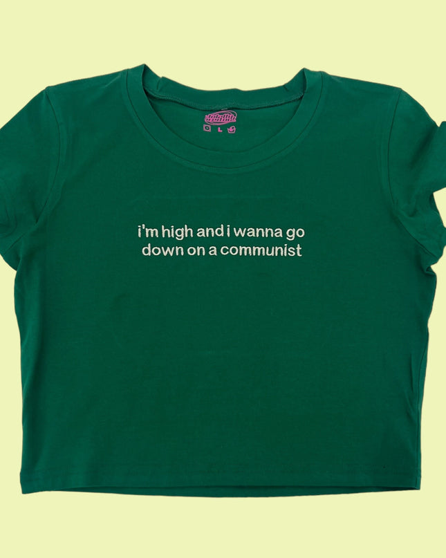 a green t - shirt with a quote on it