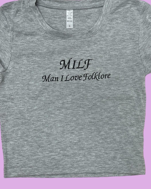 a women&#39;s t - shirt with the words milli man i love folklore